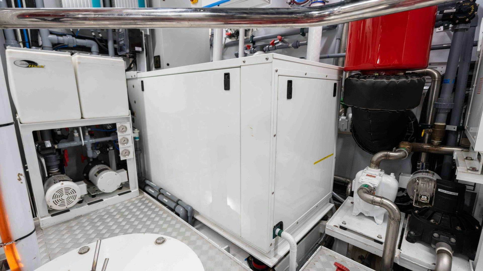 a large white machine aboard NEREUS Yacht for Sale