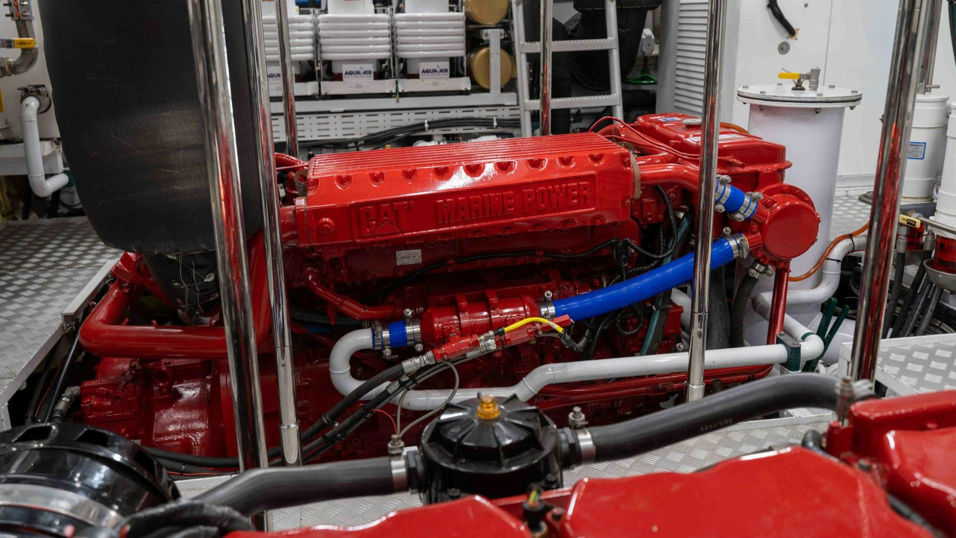 a red car engine aboard NEREUS Yacht for Sale