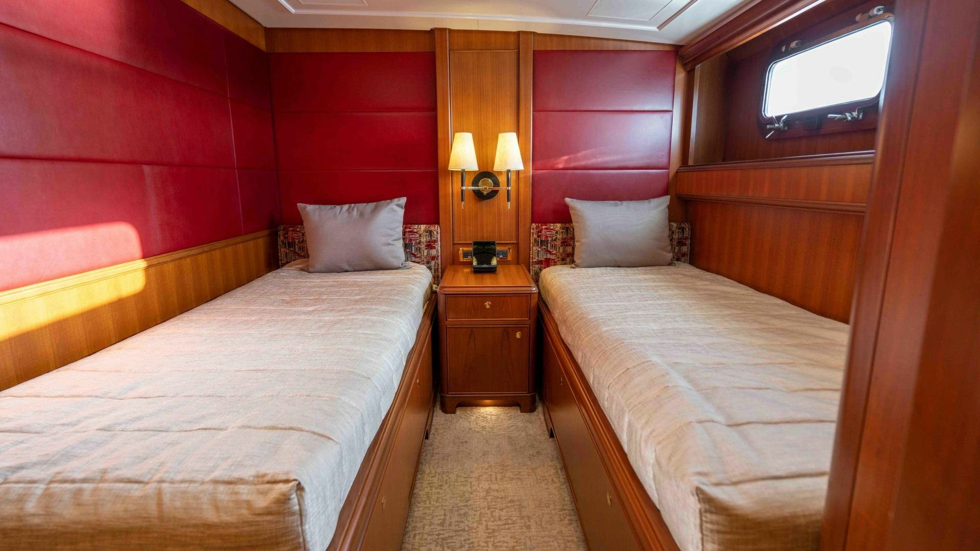 a couple of beds in a room aboard NEREUS Yacht for Sale