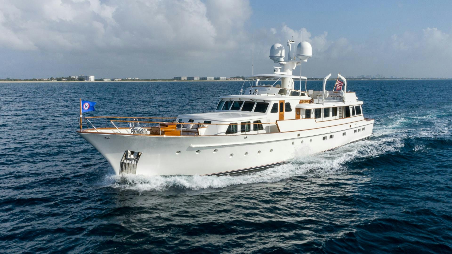 a large white boat in the water aboard NEREUS Yacht for Sale