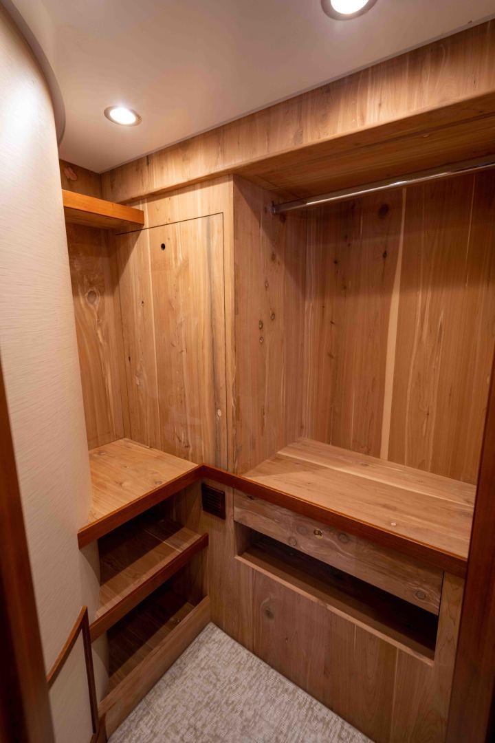 a room with wooden walls aboard NEREUS Yacht for Sale