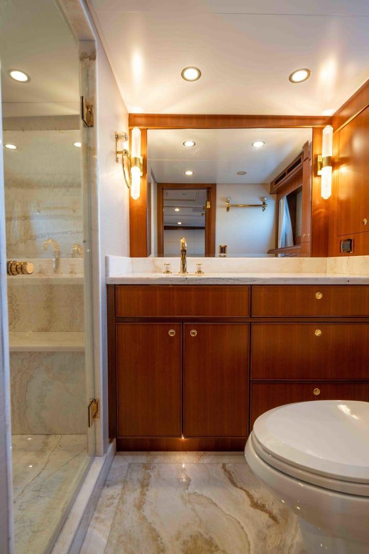 a bathroom with a glass shower aboard NEREUS Yacht for Sale