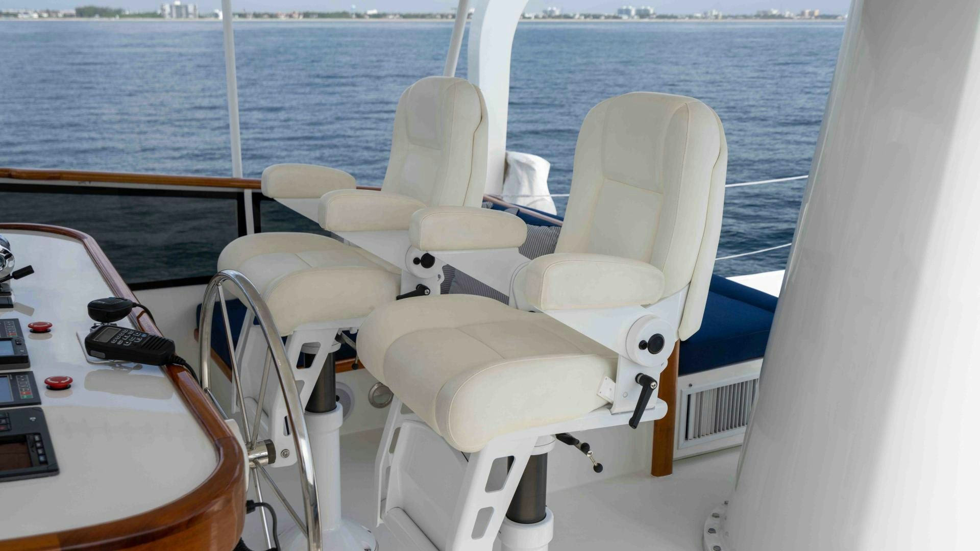 a boat with chairs on it aboard NEREUS Yacht for Sale