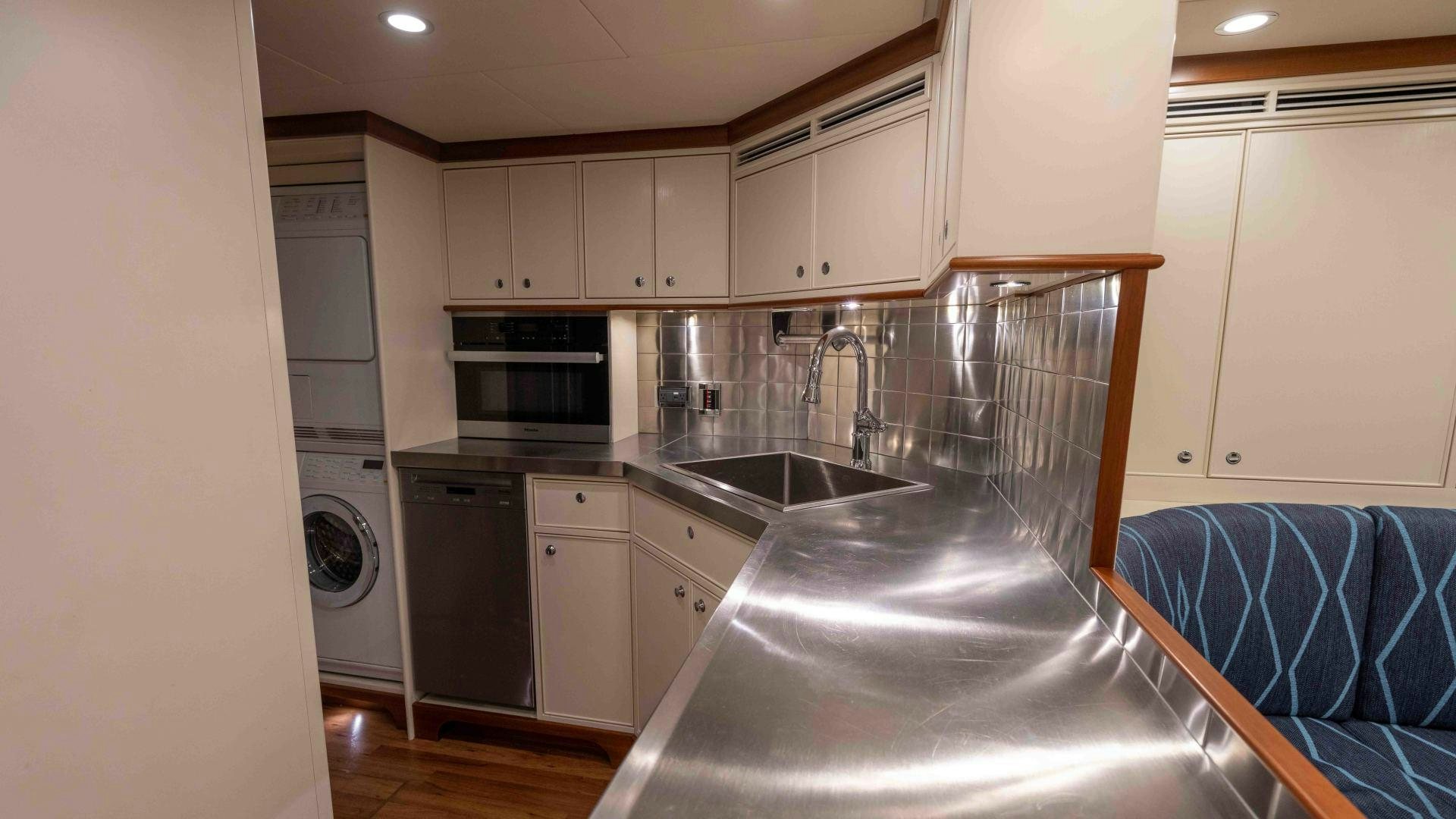 a kitchen with a large sink aboard NEREUS Yacht for Sale