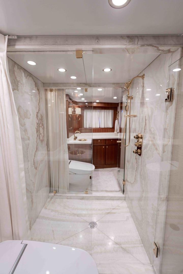 a bathroom with a shower and sink aboard NEREUS Yacht for Sale