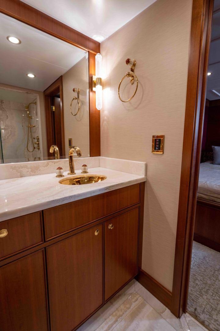 a bathroom with a sink and a mirror aboard NEREUS Yacht for Sale