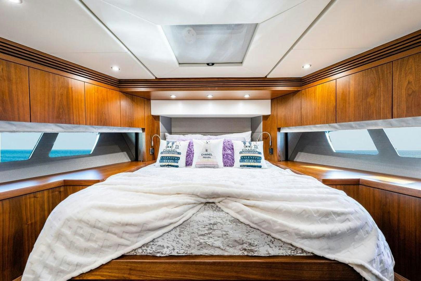 a bed in a room aboard RAPALLO V Yacht for Sale