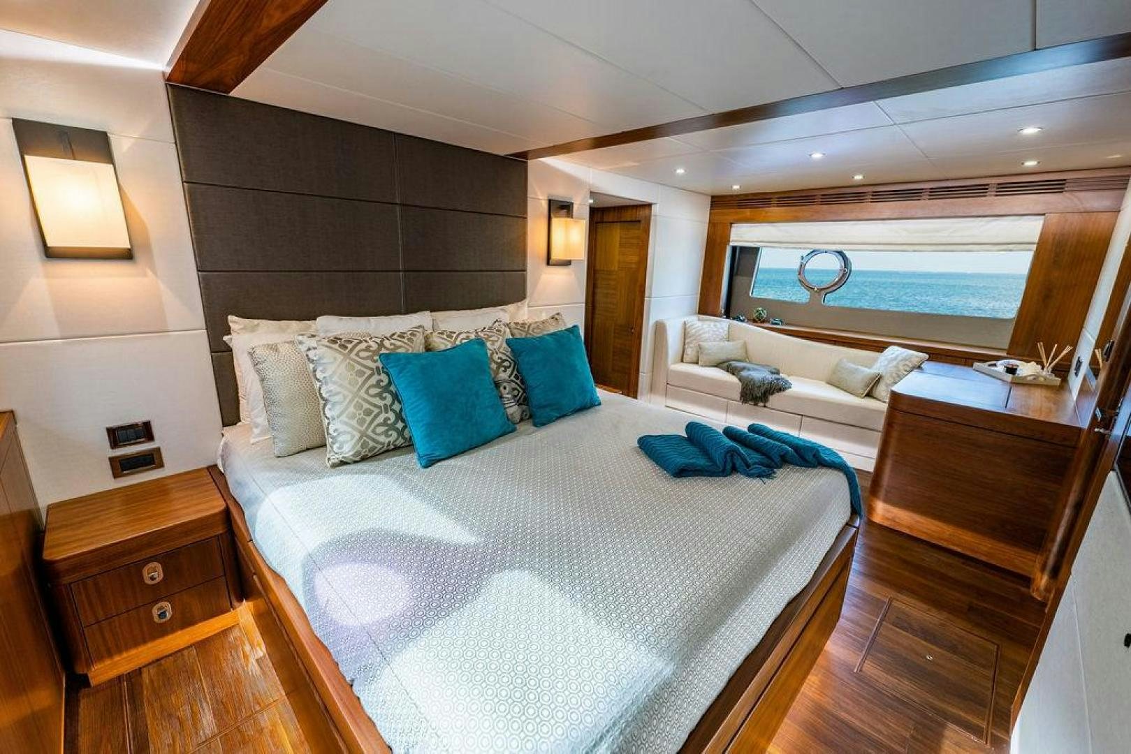 a large bedroom with a large bed aboard RAPALLO V Yacht for Sale
