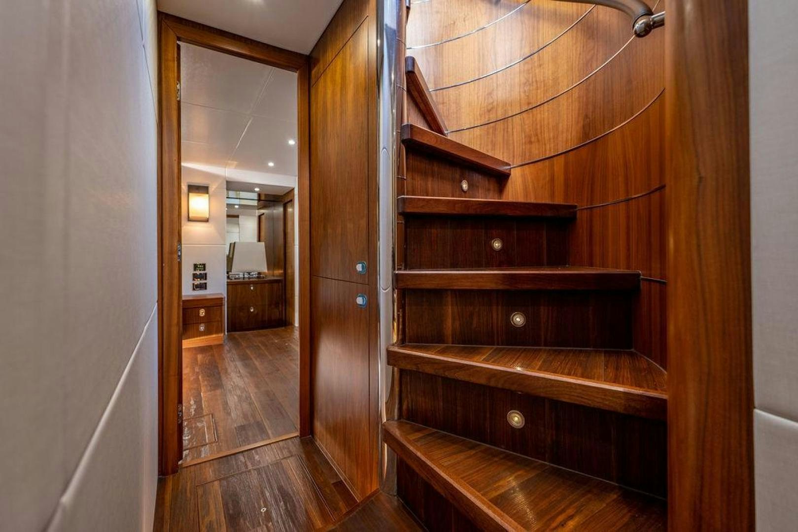 a wood cabinet in a room aboard RAPALLO V Yacht for Sale