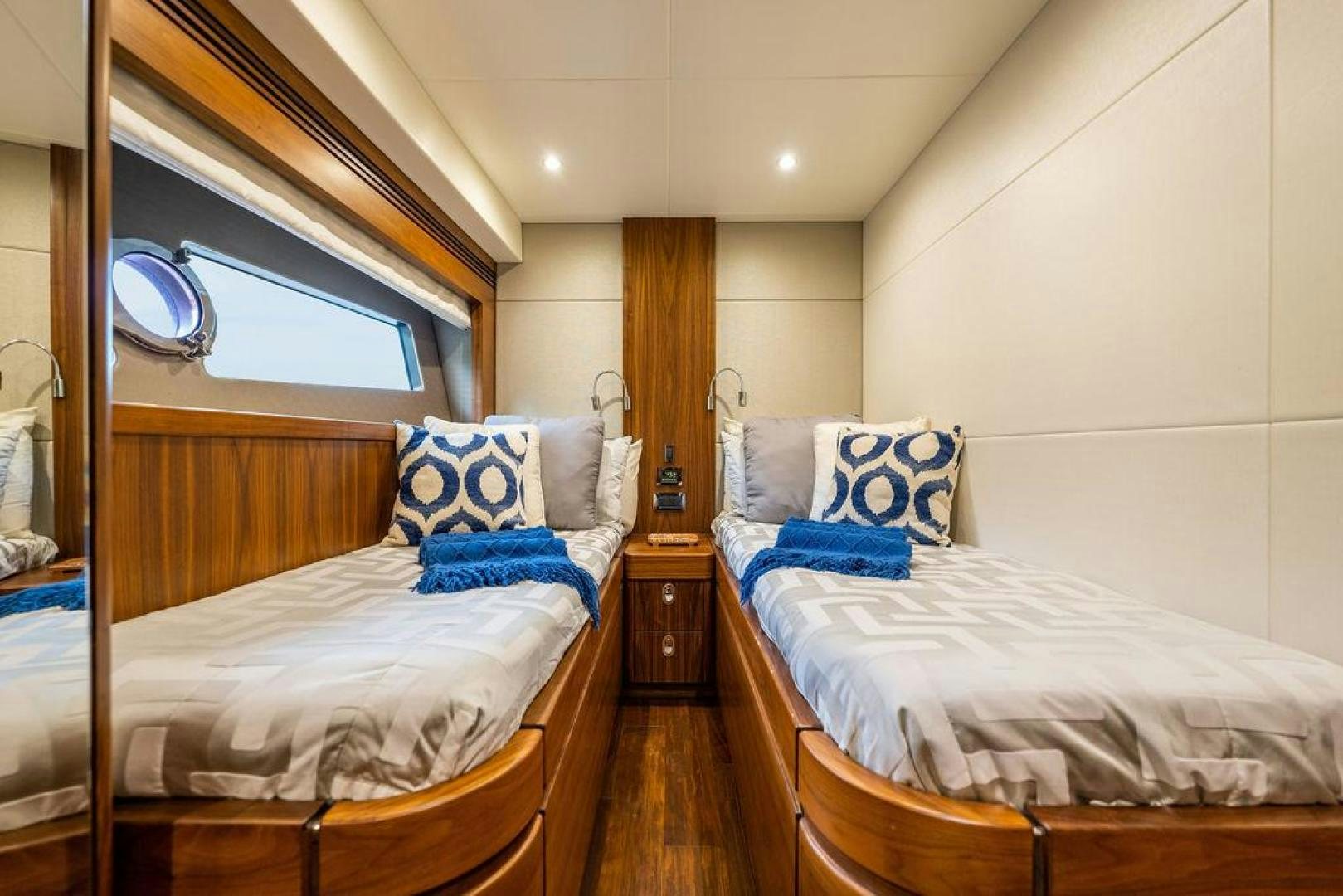 a couple of beds in a room aboard RAPALLO V Yacht for Sale