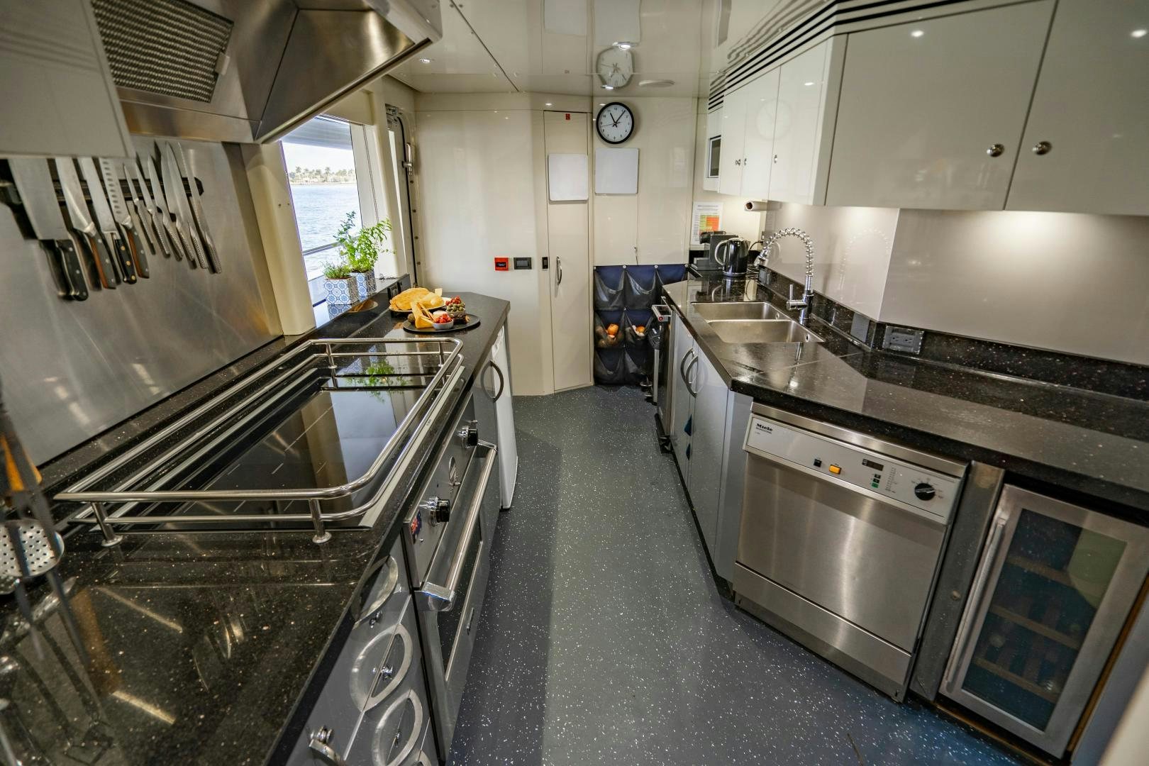 a kitchen with stainless steel appliances aboard MY SPIRIT Yacht for Sale