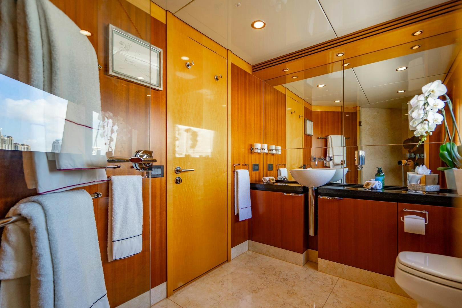 a bathroom with a large mirror aboard MY SPIRIT Yacht for Sale