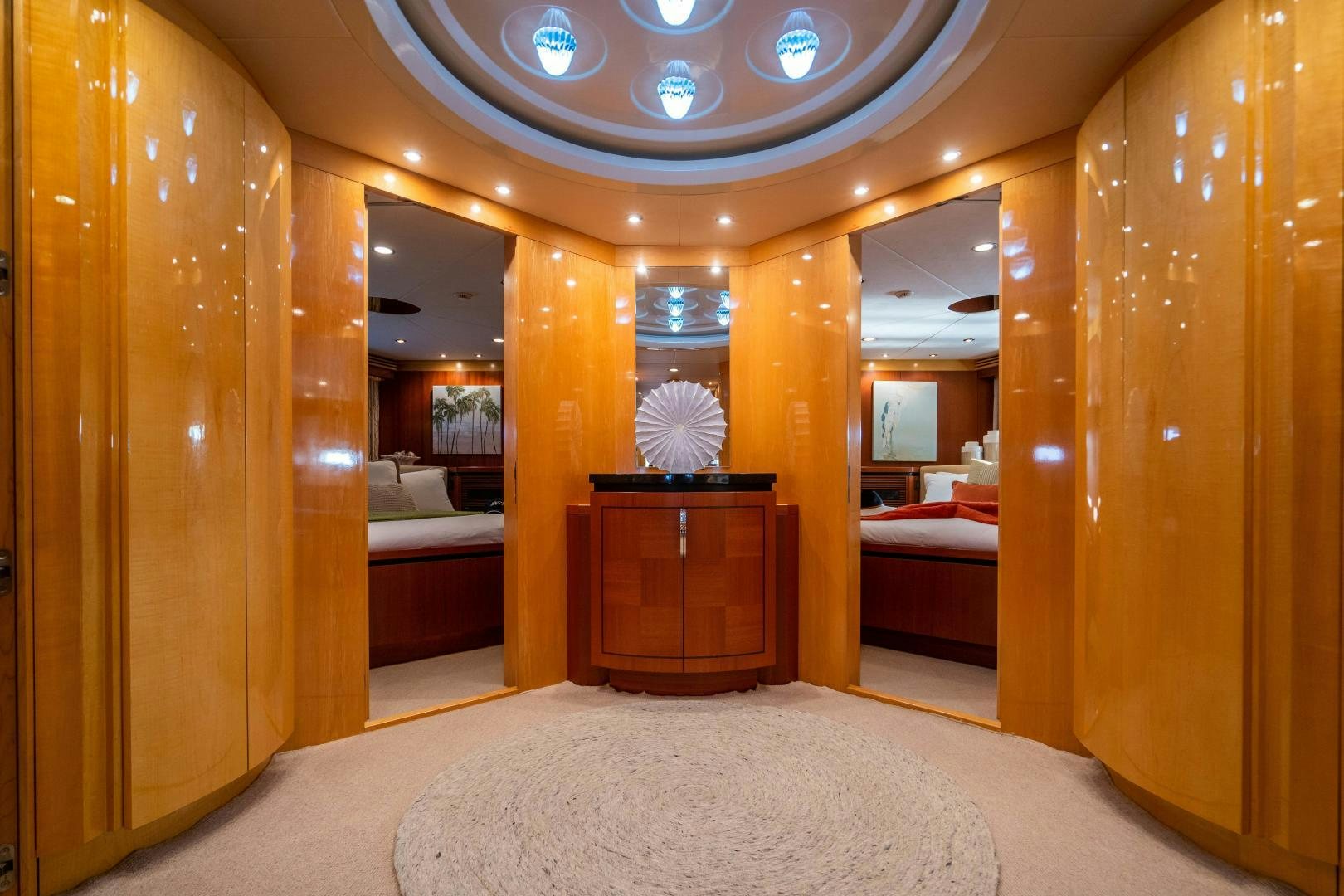 a room with a bed and a dresser aboard MY SPIRIT Yacht for Sale