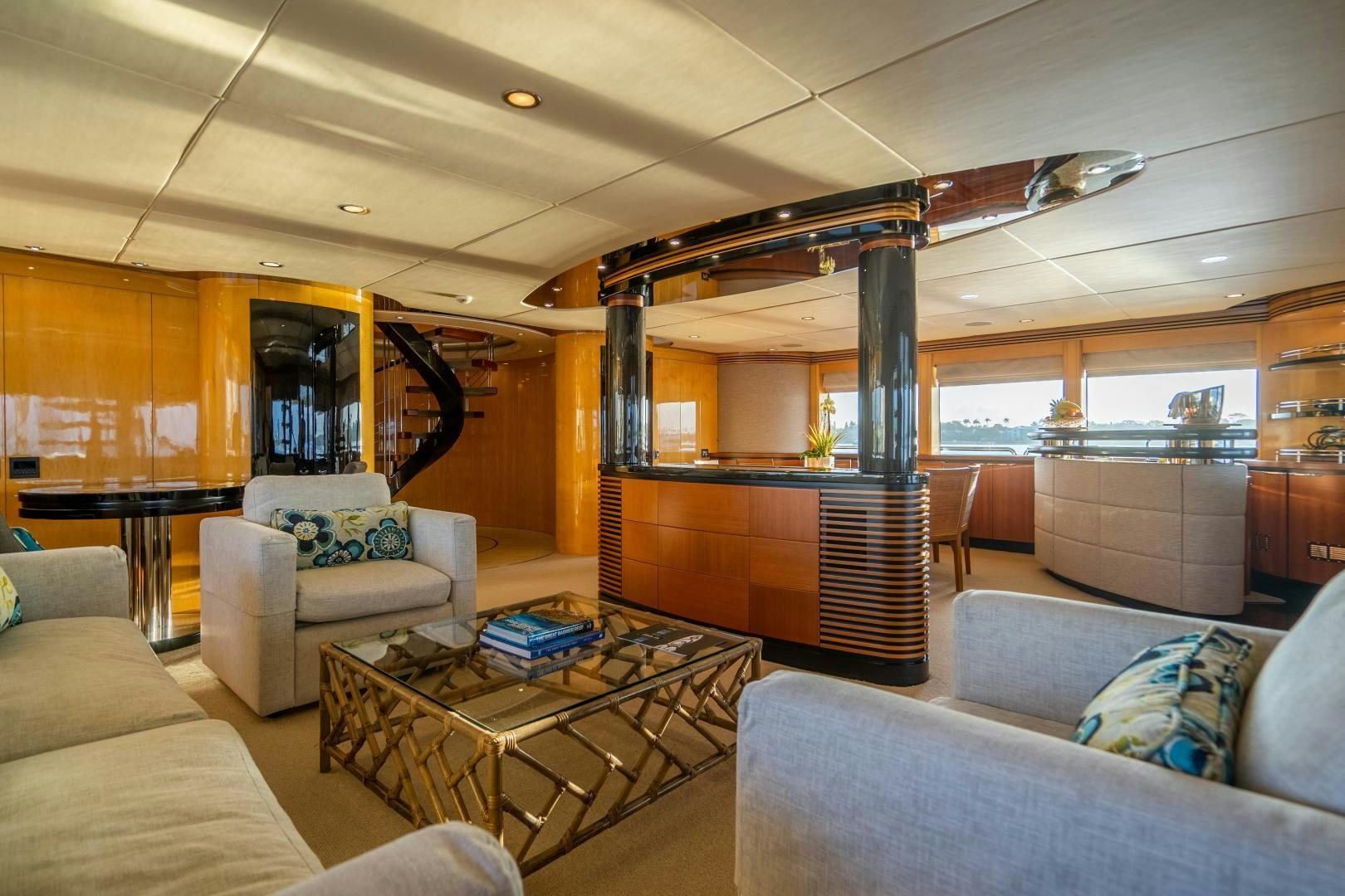 a living room with a large fireplace aboard MY SPIRIT Yacht for Sale