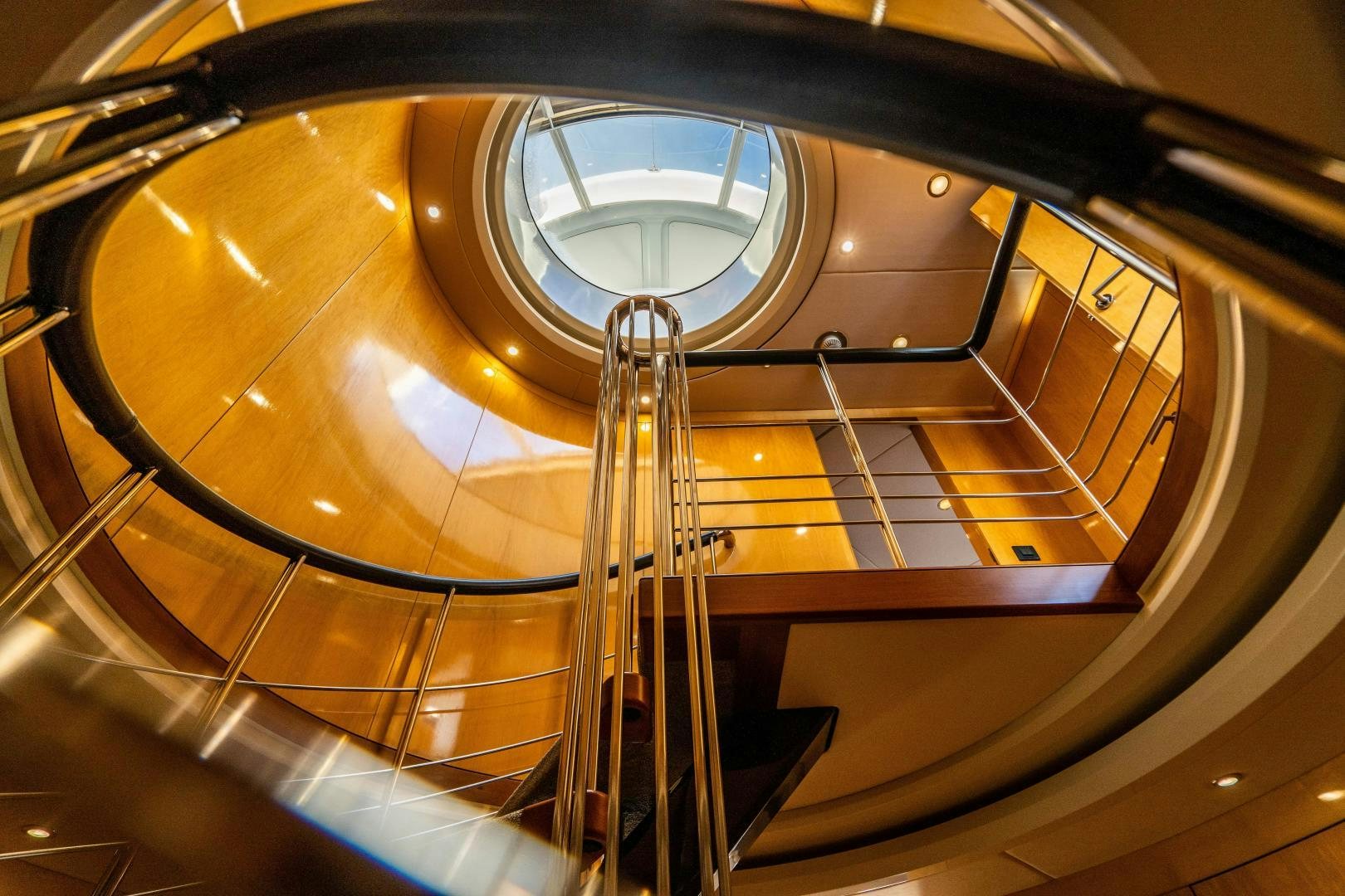a spiral staircase with a spiral staircase aboard MY SPIRIT Yacht for Sale