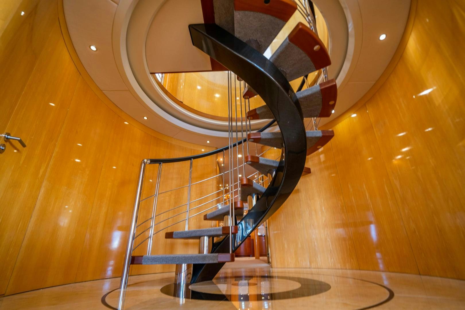 a staircase with a metal railing aboard MY SPIRIT Yacht for Sale