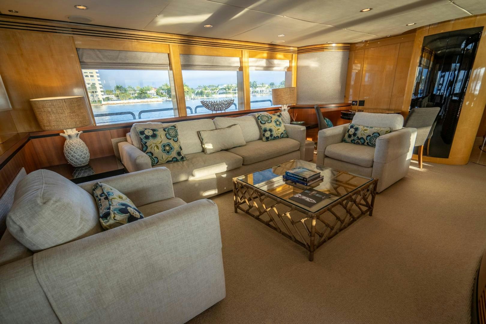 a living room with a couch and a coffee table aboard MY SPIRIT Yacht for Sale