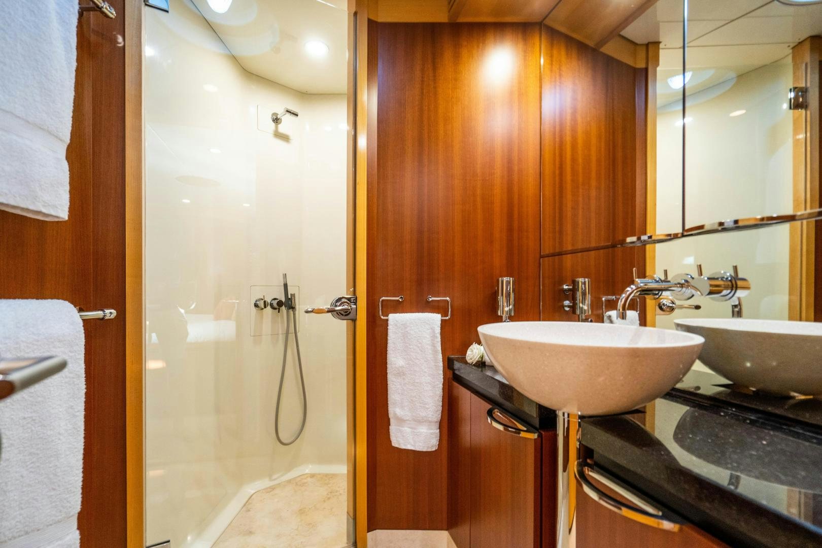 a bathroom with a sink and a shower aboard MY SPIRIT Yacht for Sale