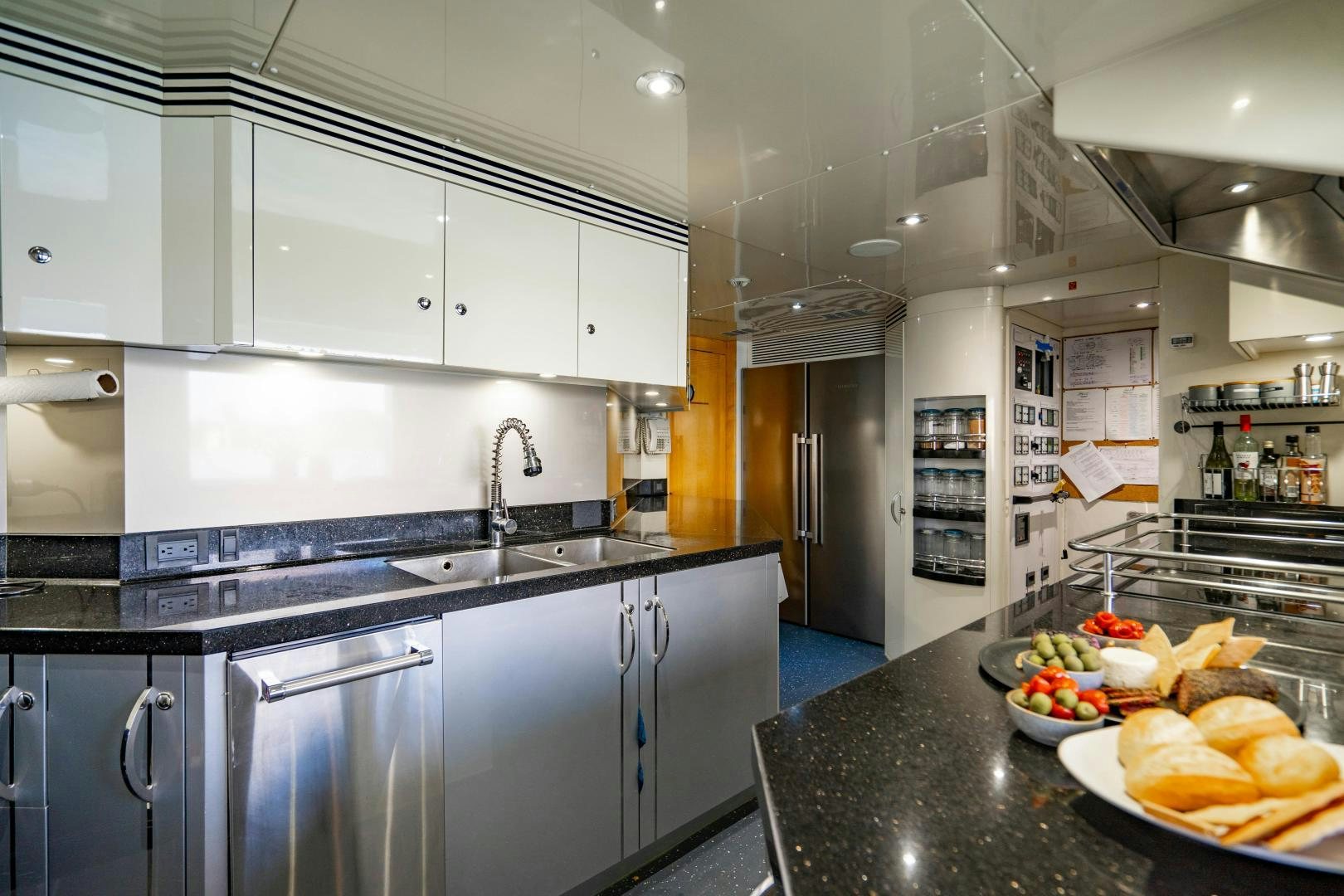 a kitchen with a large island aboard MY SPIRIT Yacht for Sale