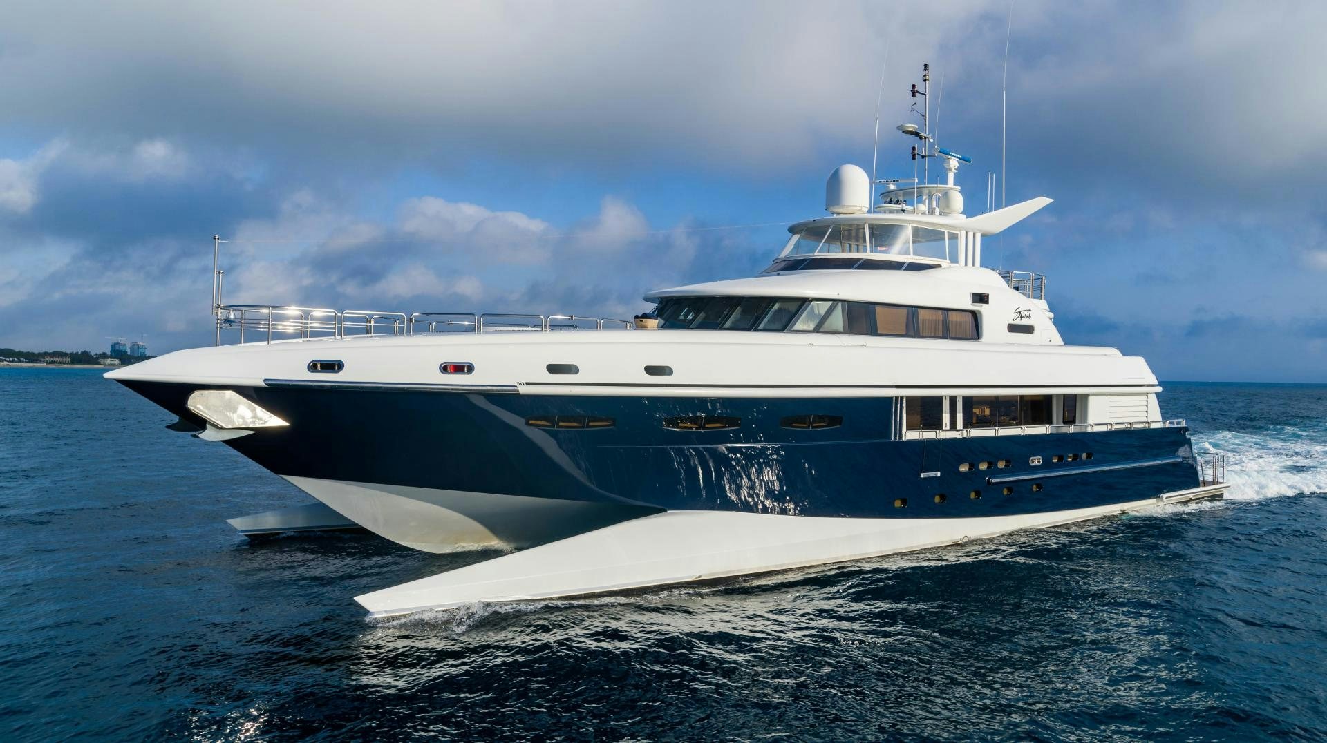 a white yacht on the water aboard MY SPIRIT Yacht for Sale