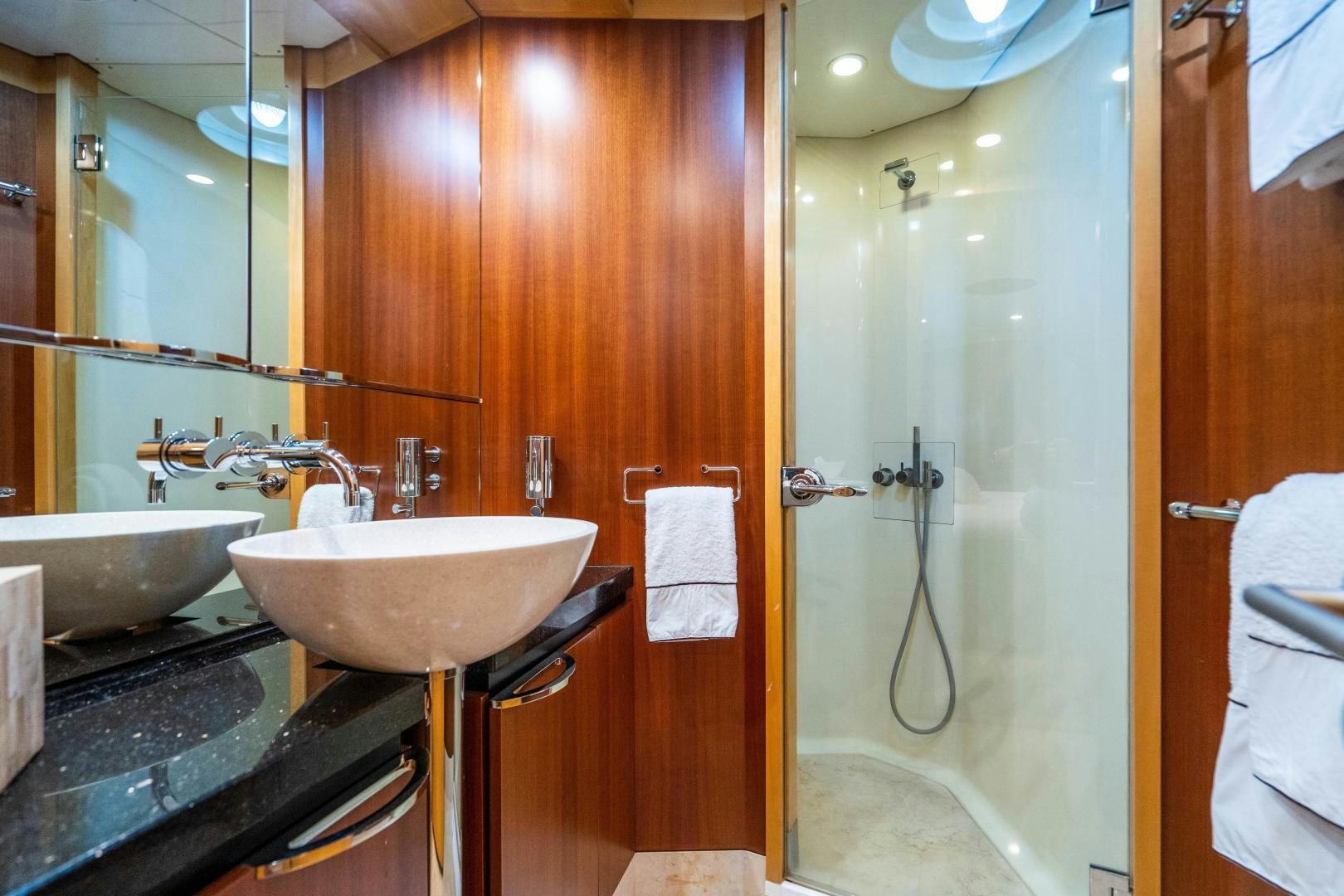 a bathroom with a sink and a shower aboard MY SPIRIT Yacht for Sale