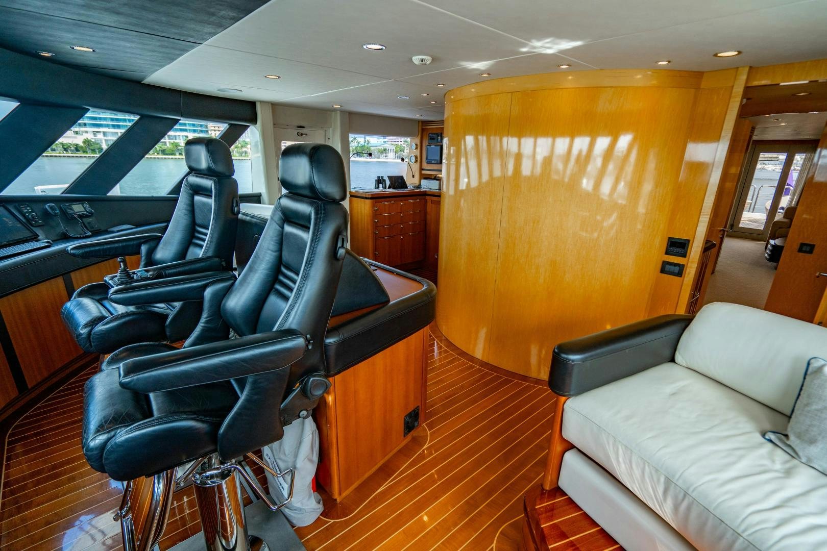 a room with chairs and a couch aboard MY SPIRIT Yacht for Sale