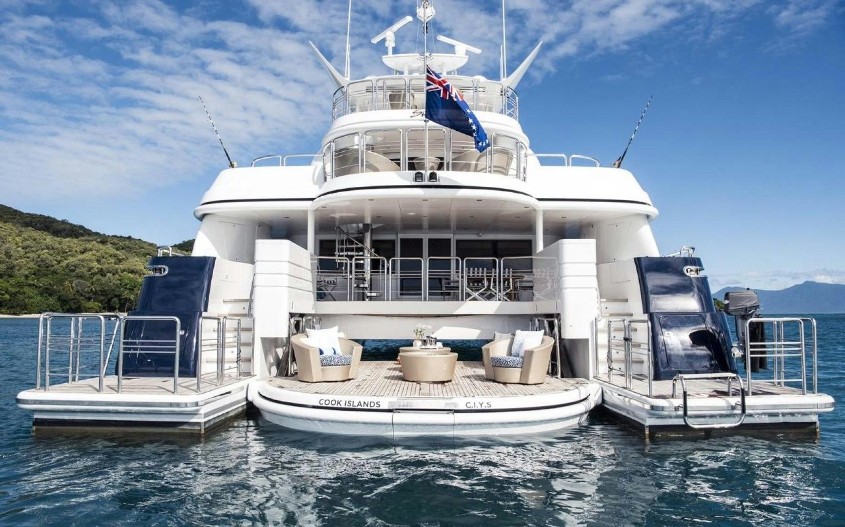 a large white boat with a flag on it aboard MY SPIRIT Yacht for Sale