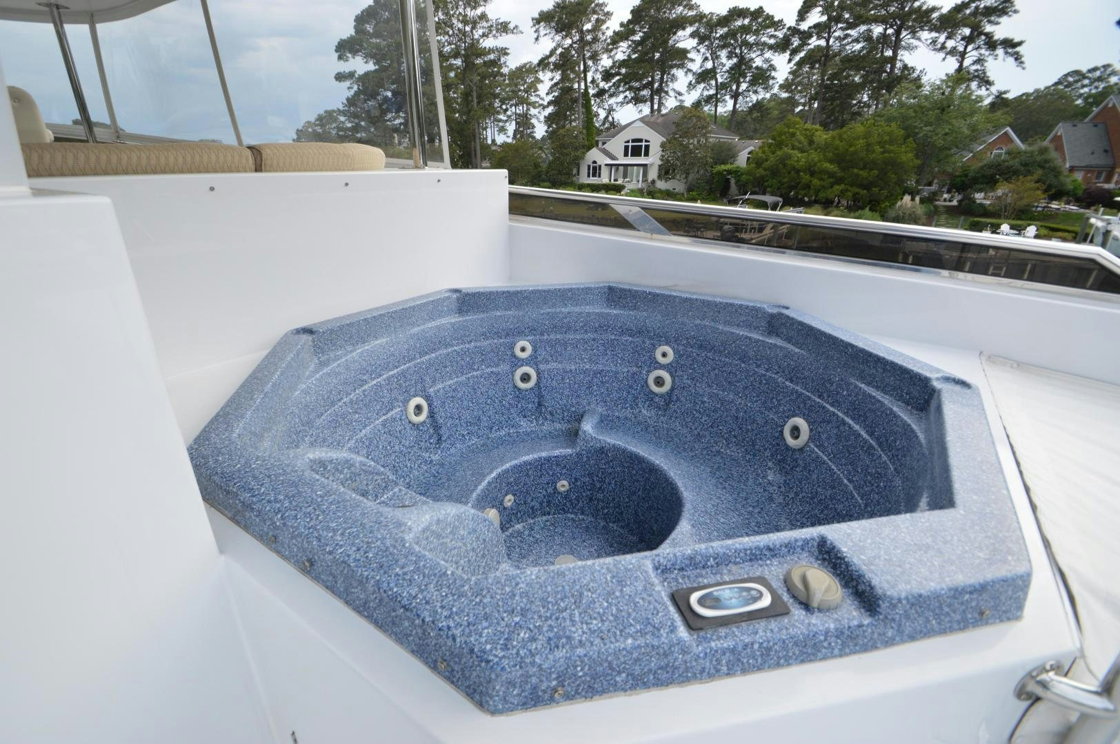a blue pool with water droplets on it aboard MARBRI Yacht for Sale