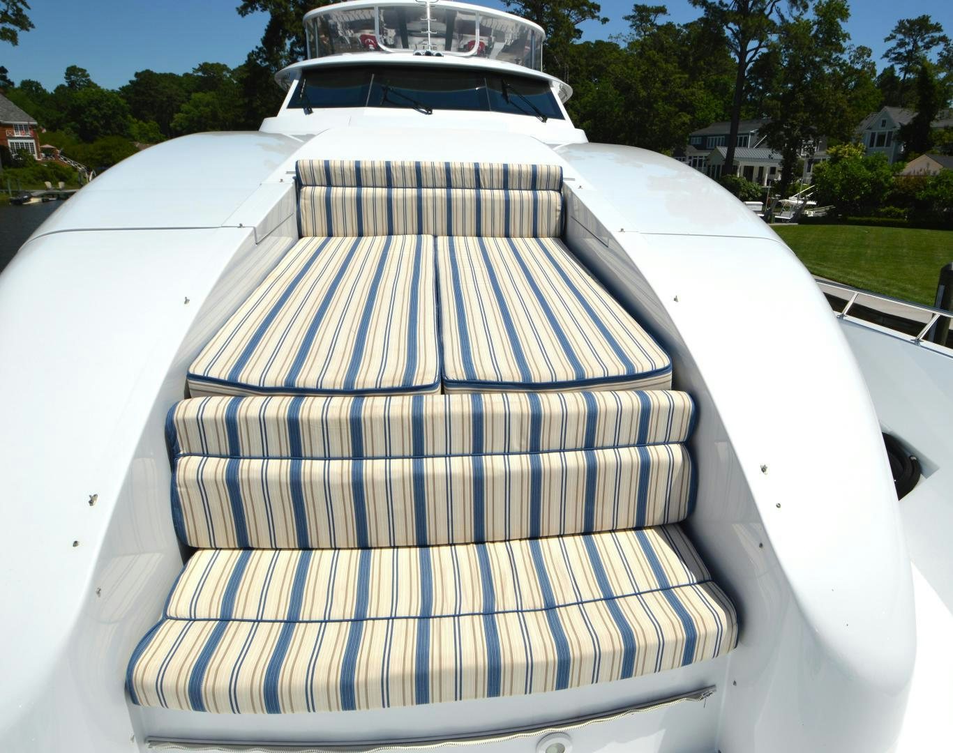 a white and black striped chair aboard MARBRI Yacht for Sale