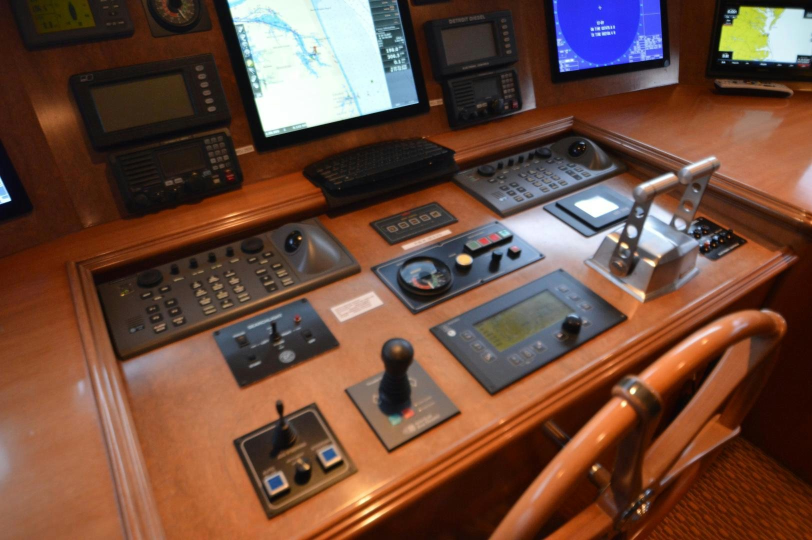 a table with many electronics on it aboard MARBRI Yacht for Sale