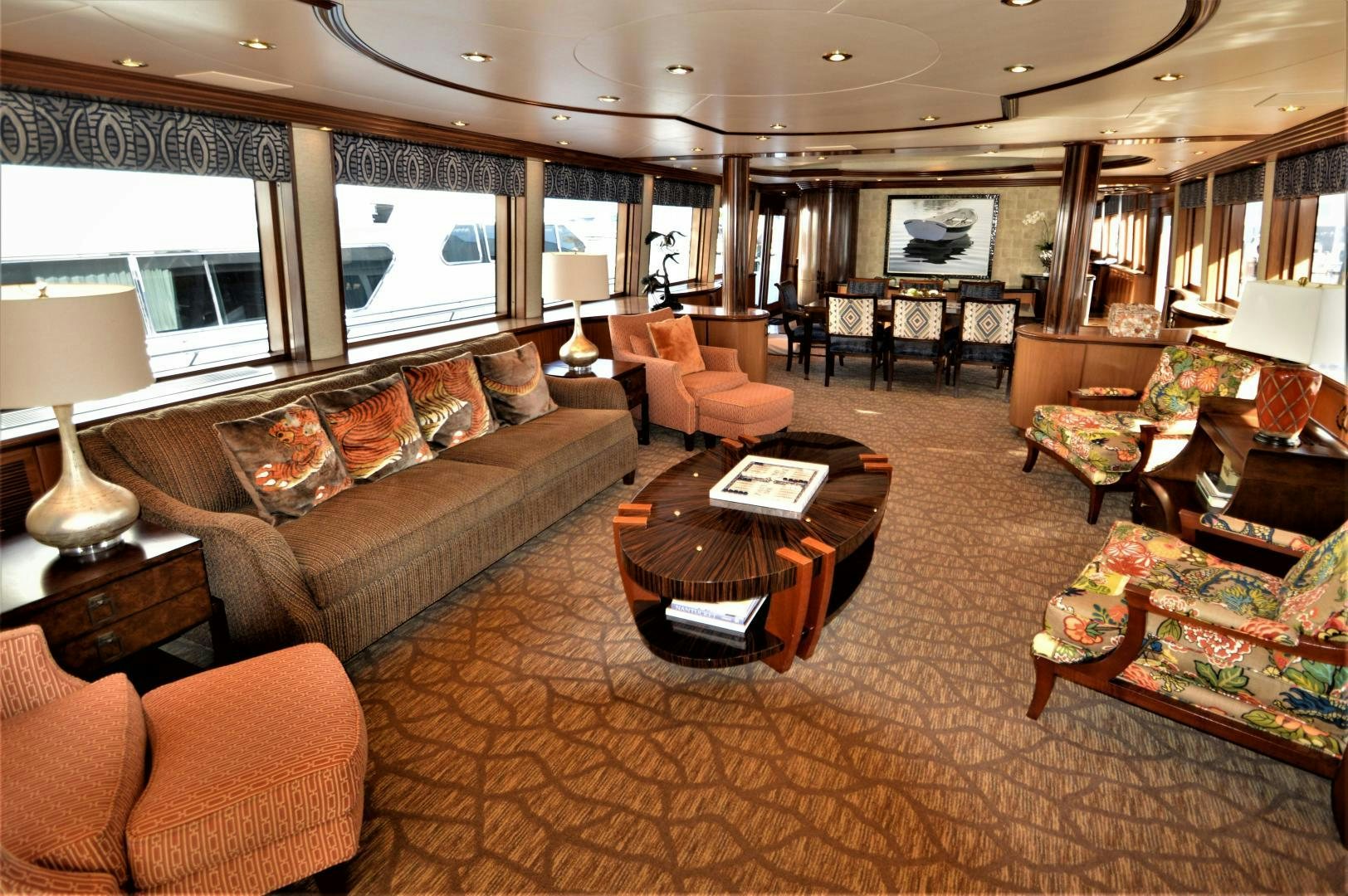 a living room with a large sofa aboard MARBRI Yacht for Sale