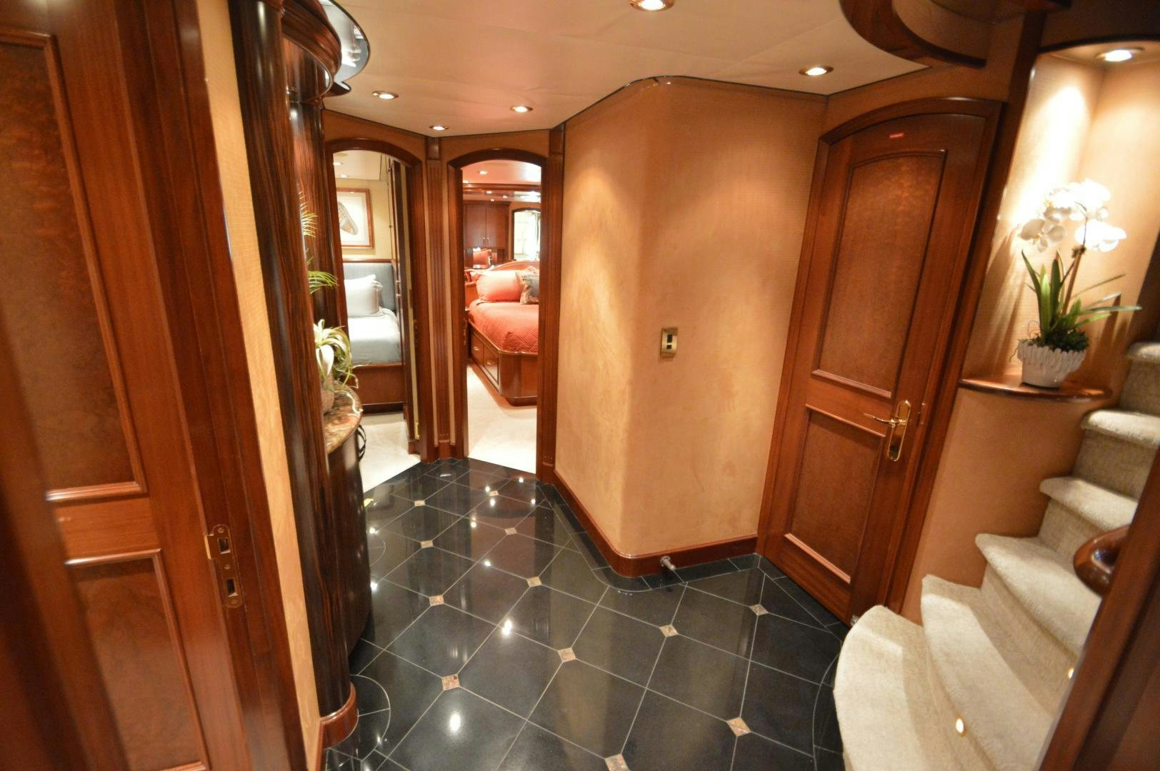 a bathroom with a tile floor aboard MARBRI Yacht for Sale