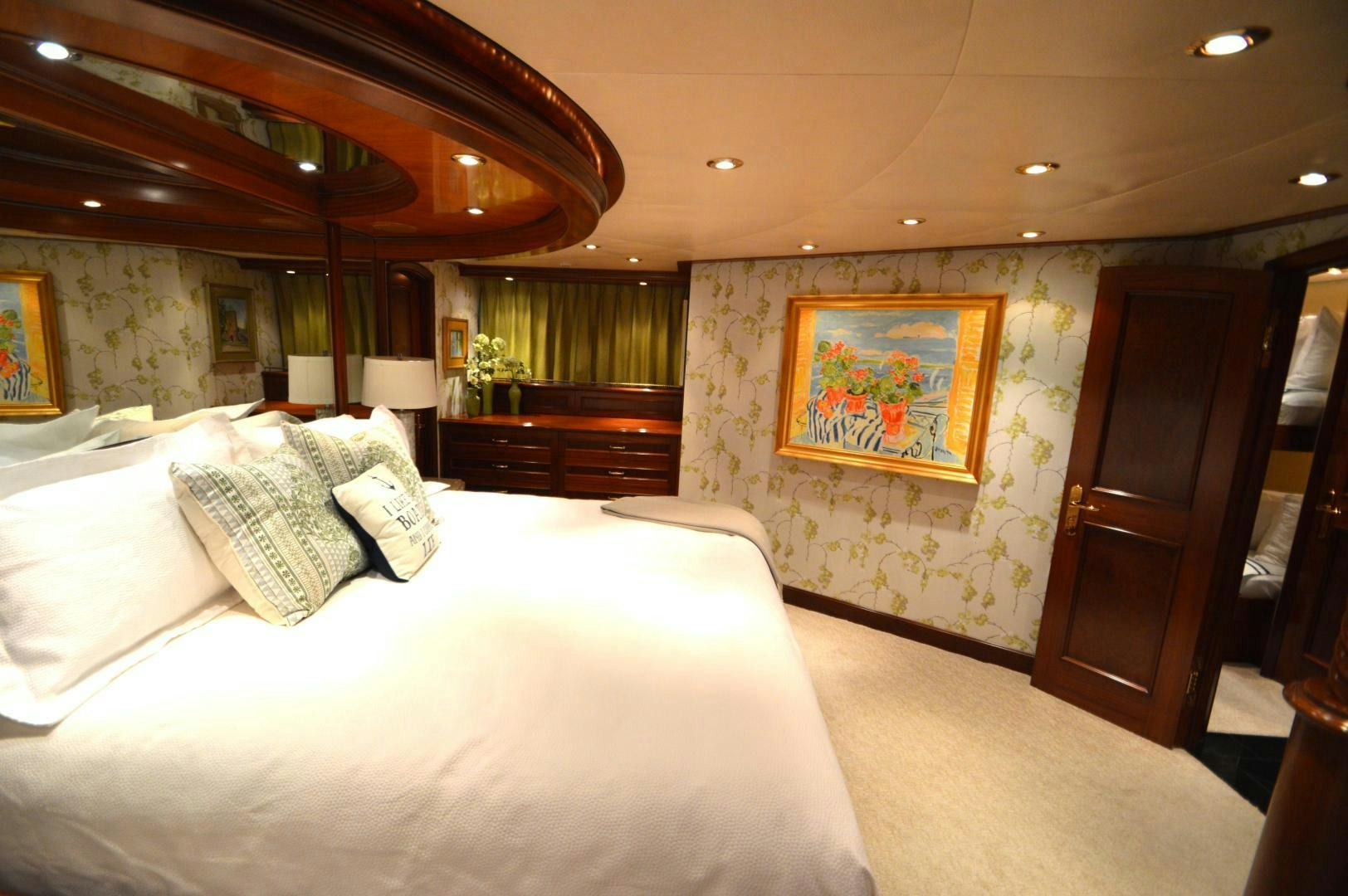 a room with a bed and a piano aboard MARBRI Yacht for Sale