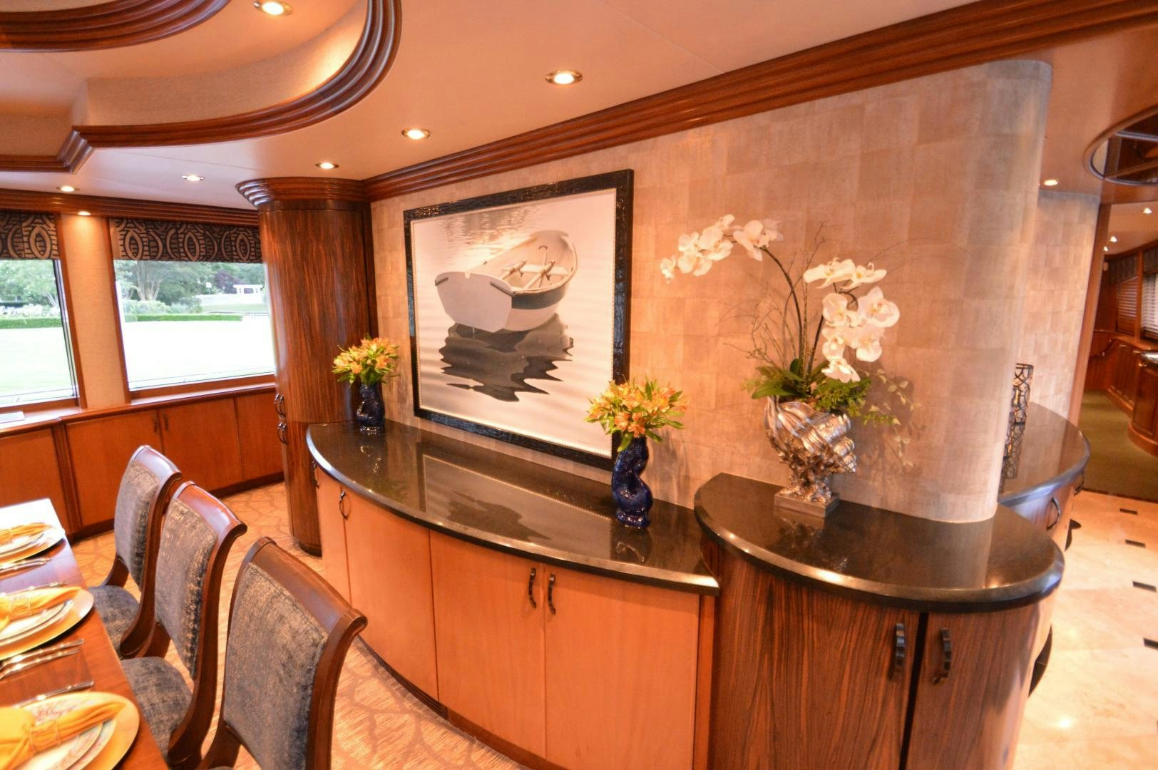 a room with a painting on the wall aboard MARBRI Yacht for Sale