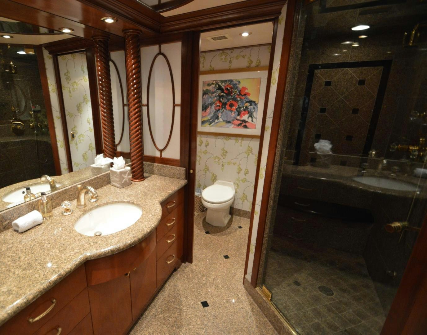 a bathroom with a sink and toilet aboard MARBRI Yacht for Sale