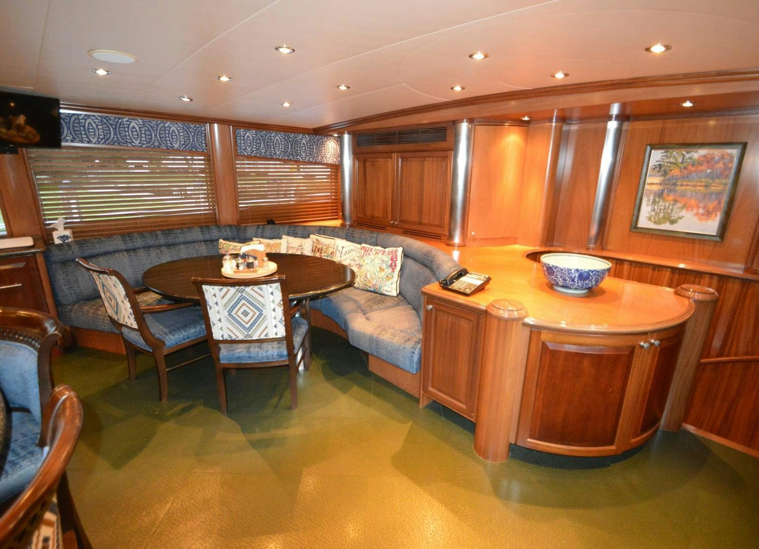a living room with a couch and a table aboard MARBRI Yacht for Sale