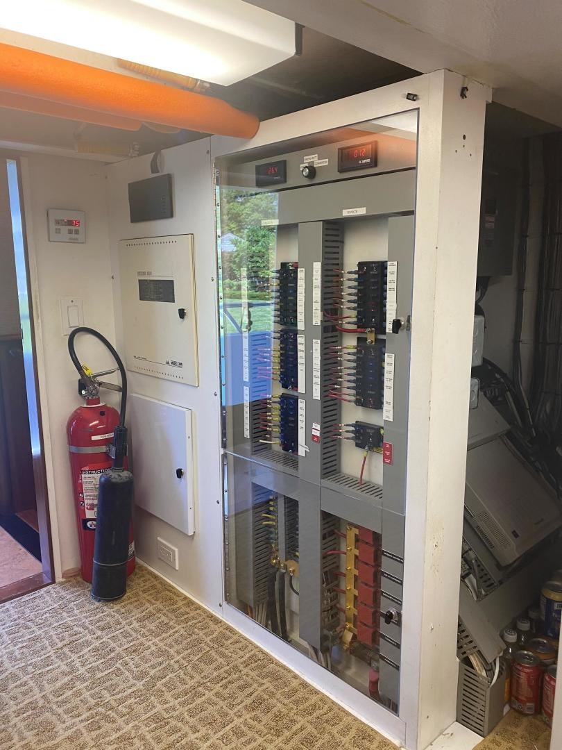 a large white server room aboard MARBRI Yacht for Sale