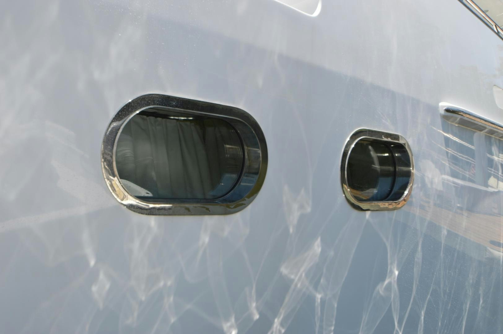 a pair of sunglasses on a car aboard MARBRI Yacht for Sale