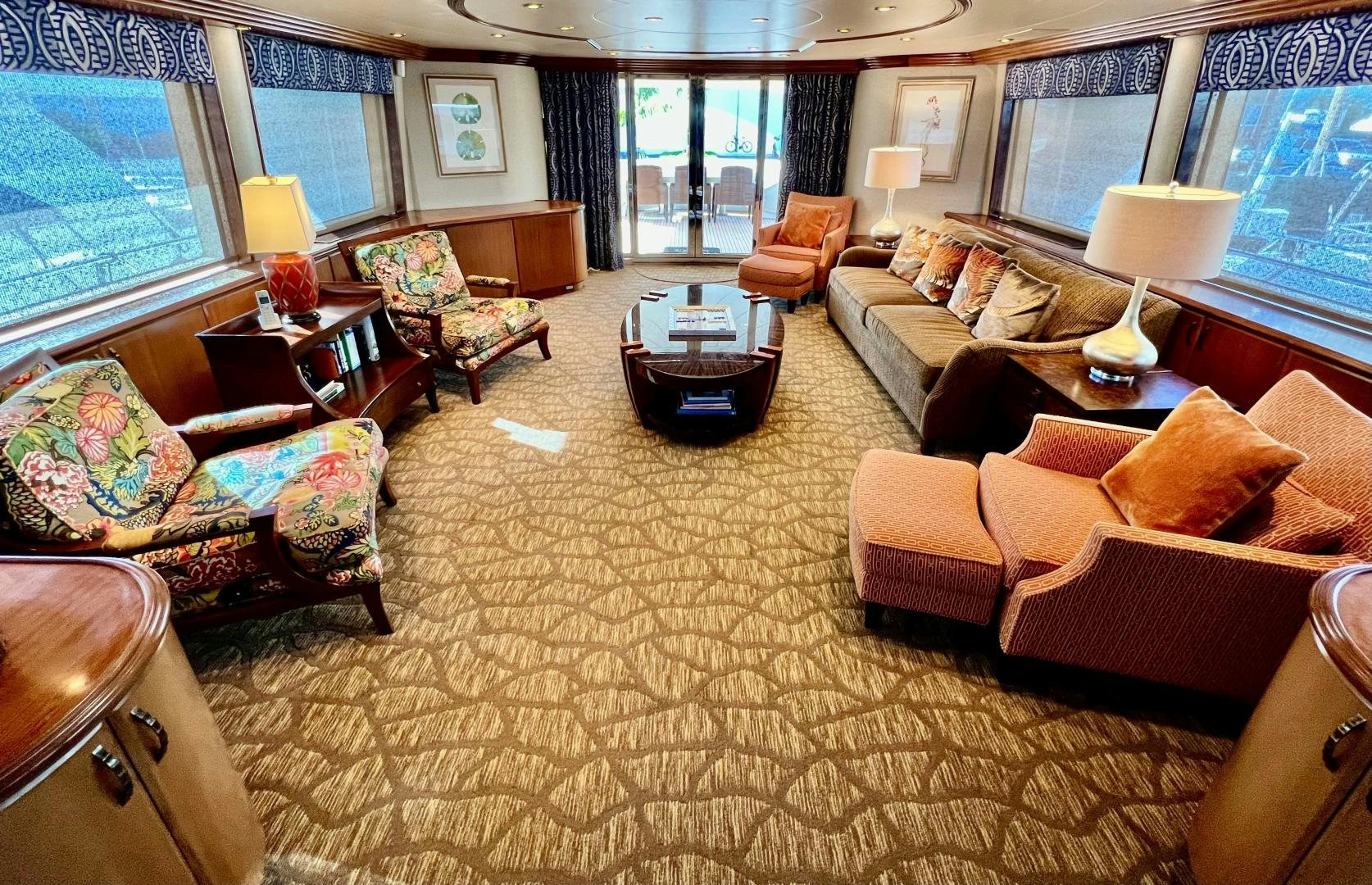 a large living room with a large window aboard MARBRI Yacht for Sale