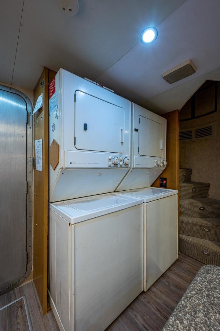 a room with a cabinet and drawers aboard ATLANTIC Yacht for Sale