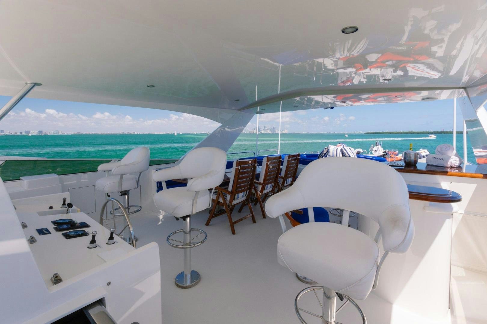a room with chairs and tables aboard ATLANTIC Yacht for Sale