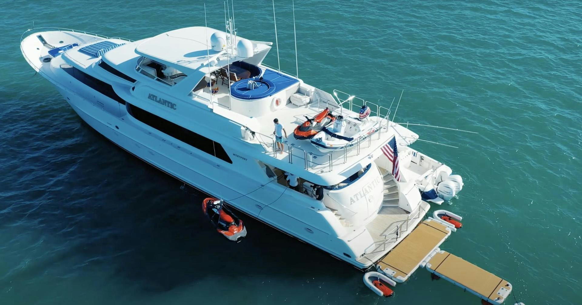 a white boat on the water aboard ATLANTIC Yacht for Sale
