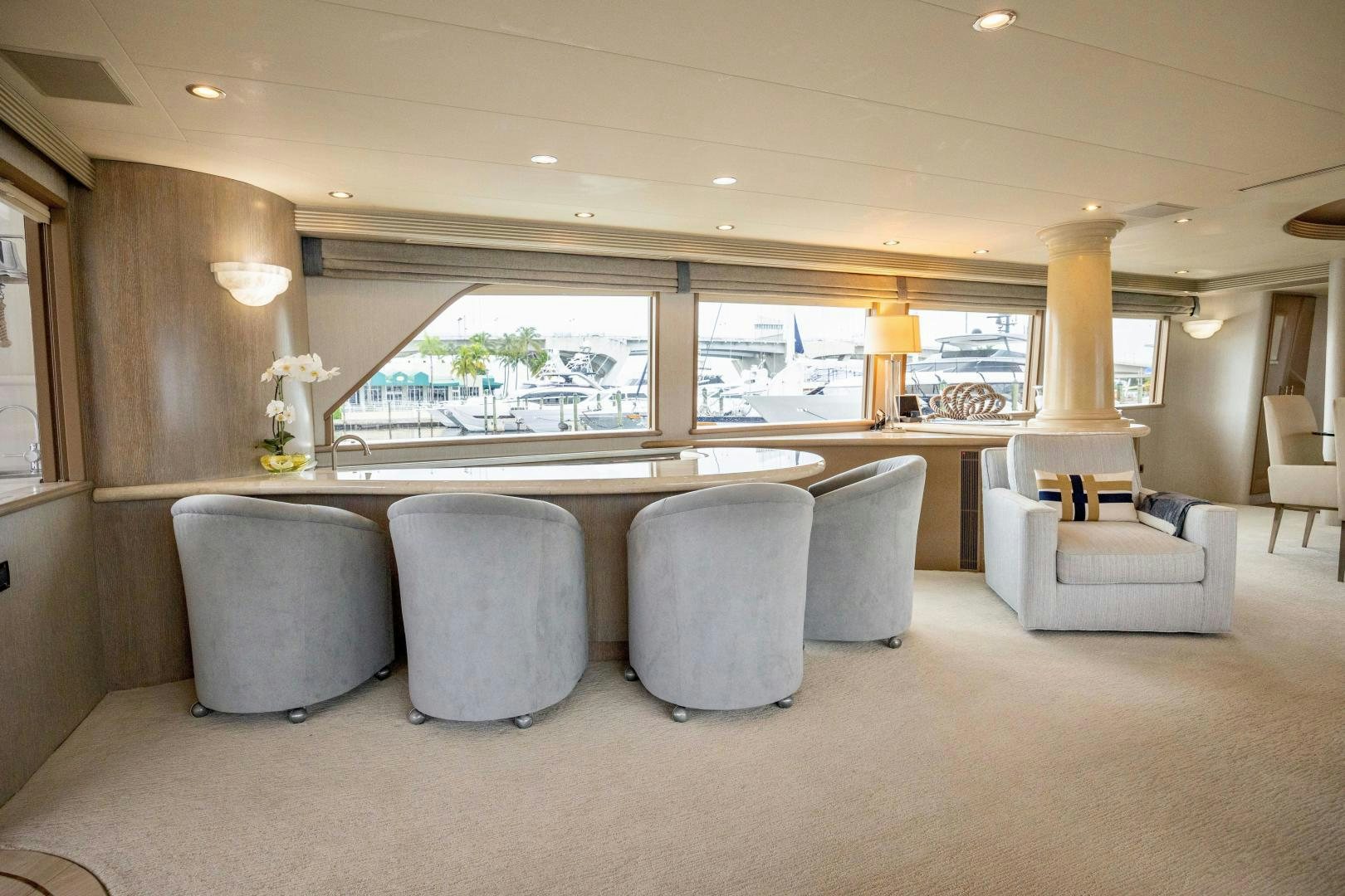a large room with a large table and chairs aboard ATLANTIC Yacht for Sale
