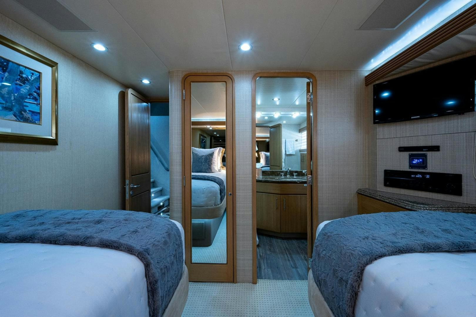a bedroom with two beds aboard ATLANTIC Yacht for Sale