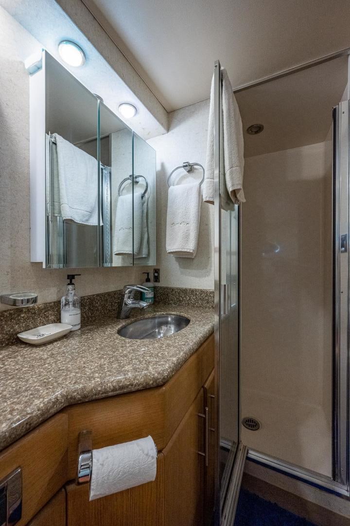 a bathroom with a sink and a mirror aboard ATLANTIC Yacht for Sale