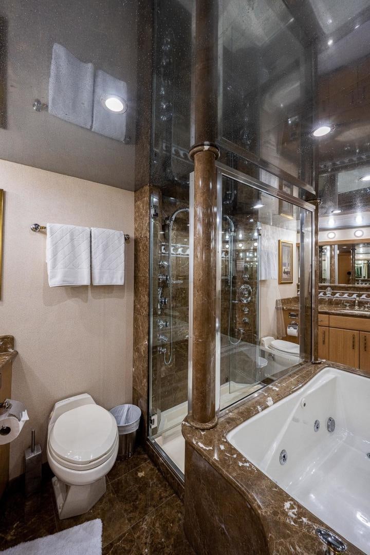 a bathroom with a glass shower aboard ATLANTIC Yacht for Sale