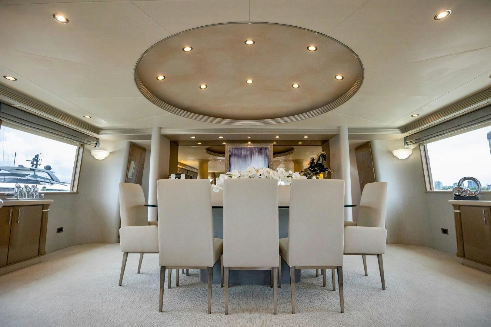 a large room with a table and chairs aboard ATLANTIC Yacht for Sale