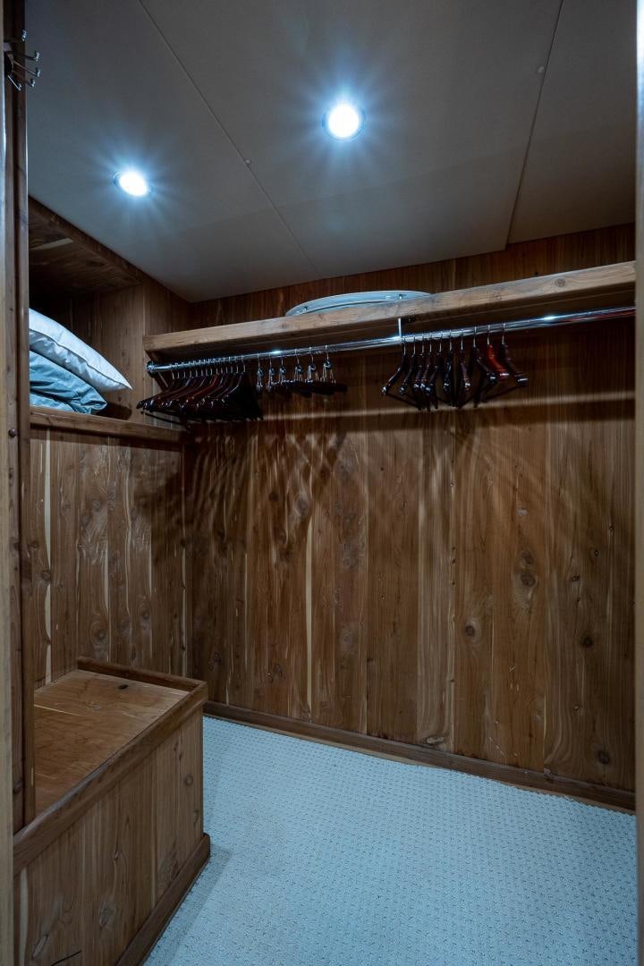 a wooden wall with a light aboard ATLANTIC Yacht for Sale