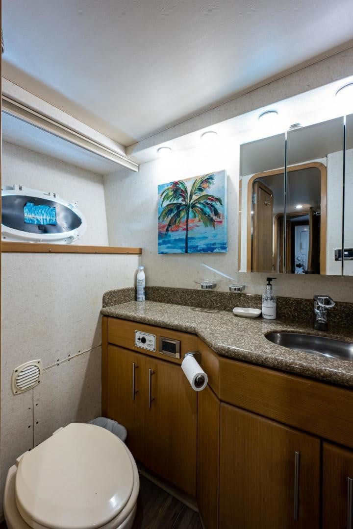a bathroom with a large mirror aboard ATLANTIC Yacht for Sale