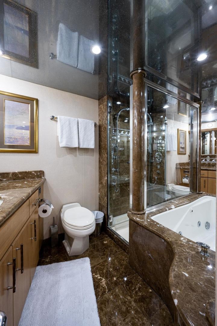 a bathroom with a stand up shower aboard ATLANTIC Yacht for Sale